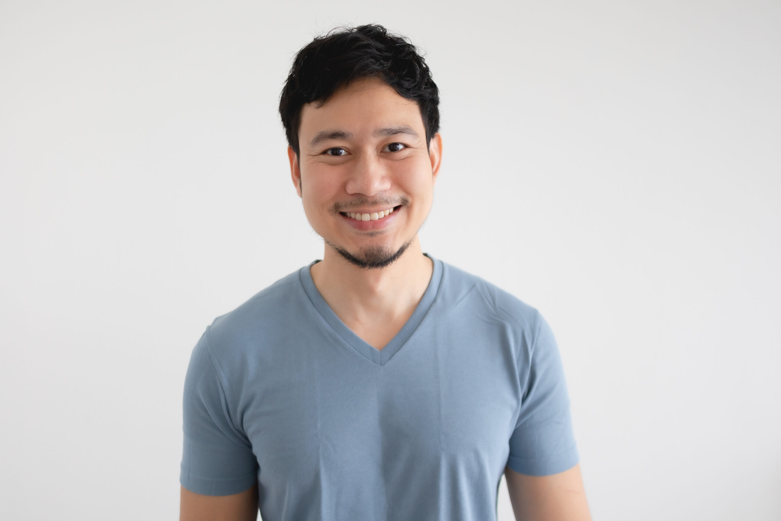 Portrait,Of,Happy,Asian,Man,In,Blue,T-shirt,On,Isolated